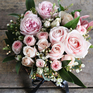 a bouquet of pastel pink roses