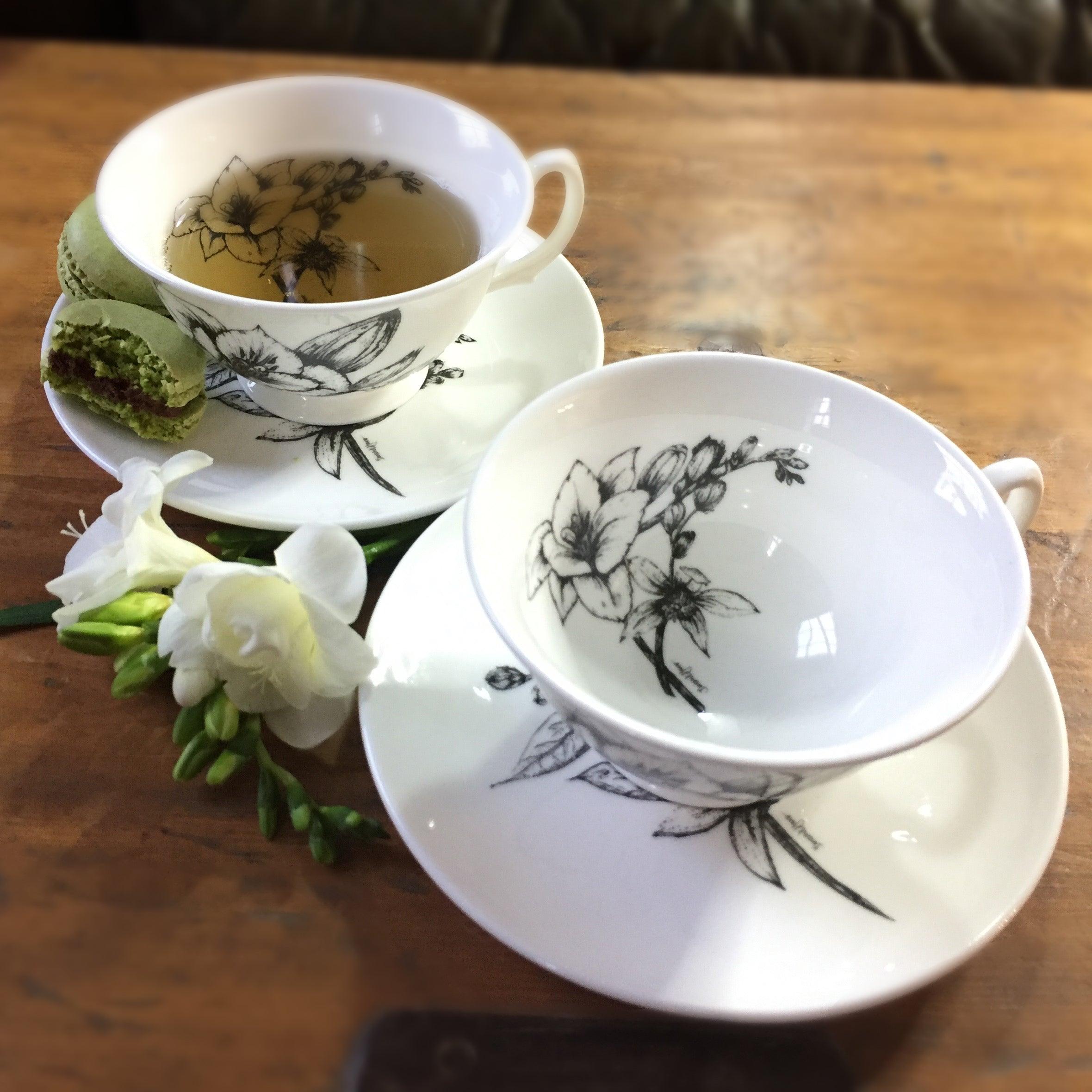 two freesia and orange blossom cups and saucers