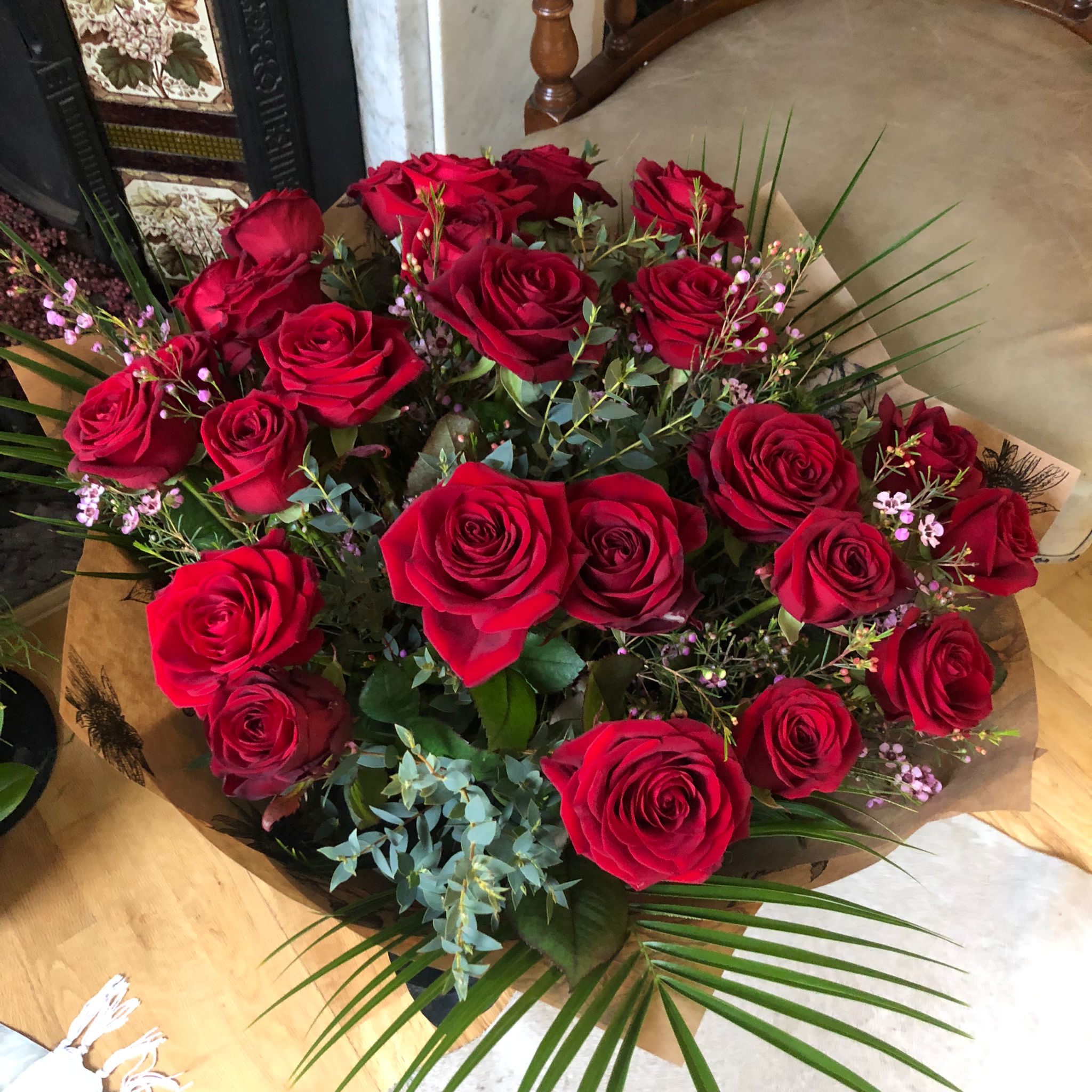 24 long stemmed red roses
