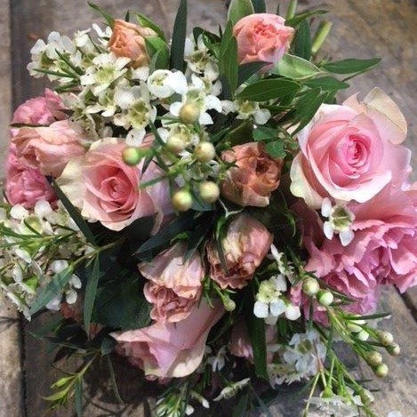 pink rose and white flower bridal bouquet