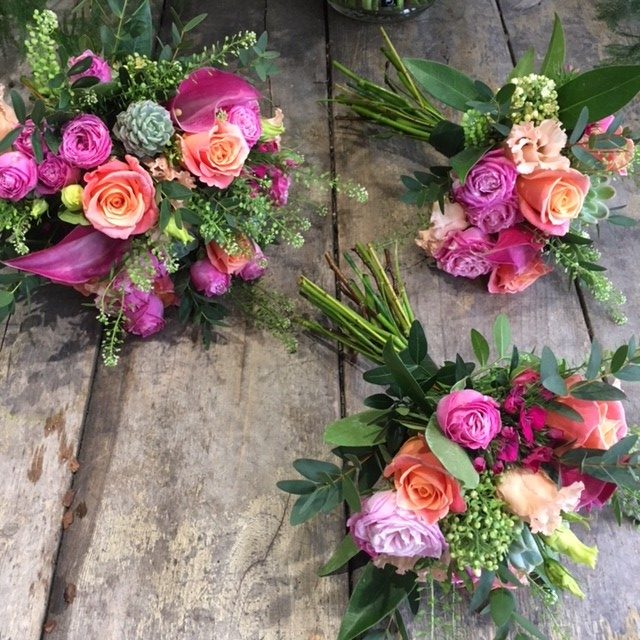 lilac and pink and peach roses bridesmaid bouquet