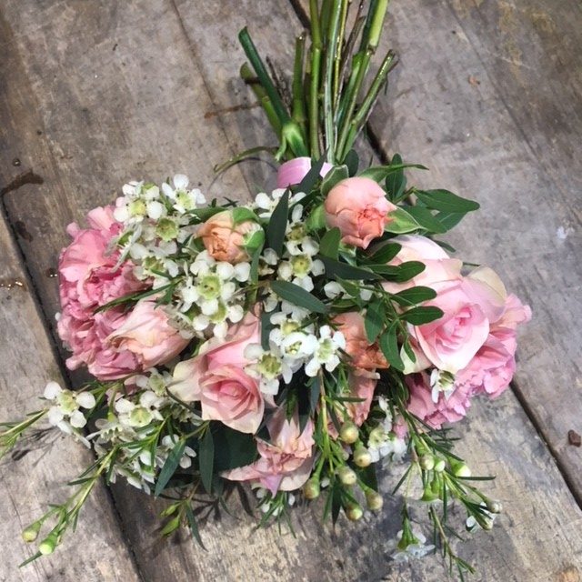 pink rose and white flower bridal bouquet