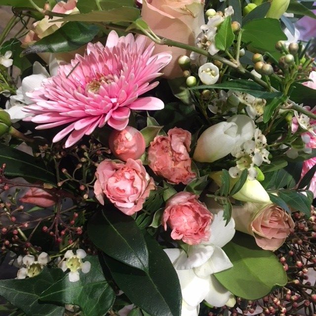 pink germini and roses with foliage bridesmaid bouquet