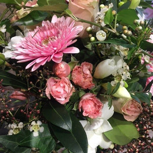 pink germini and roses with foliage bridal bouquet