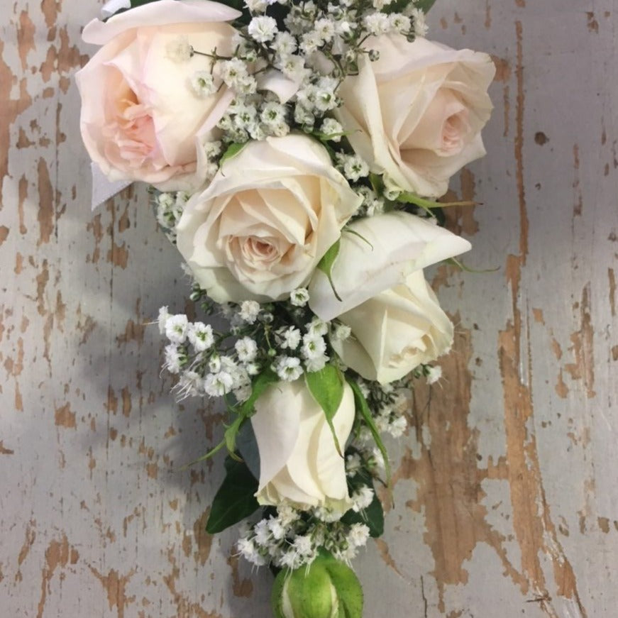 Pink and cream rose corsage