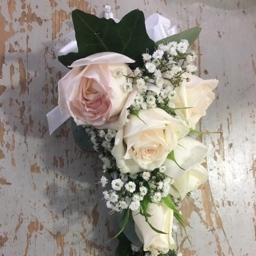 Pink and cream rose corsage