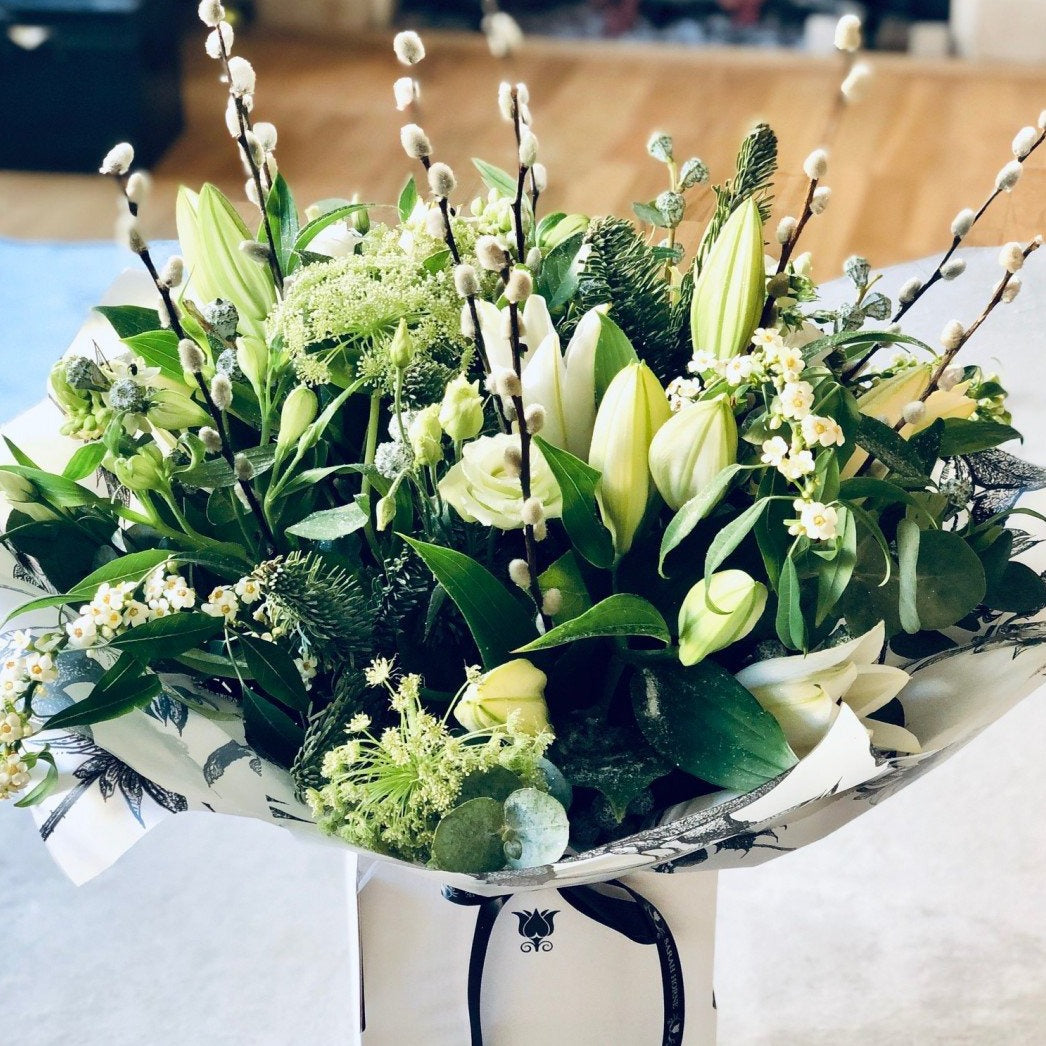 Cream roses and lilies bouquet