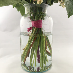 flowers arranged in a eco vase
