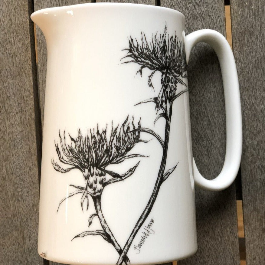 a one pint china jug with common knapweed design