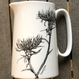 a one pint china jug with common knapweed design