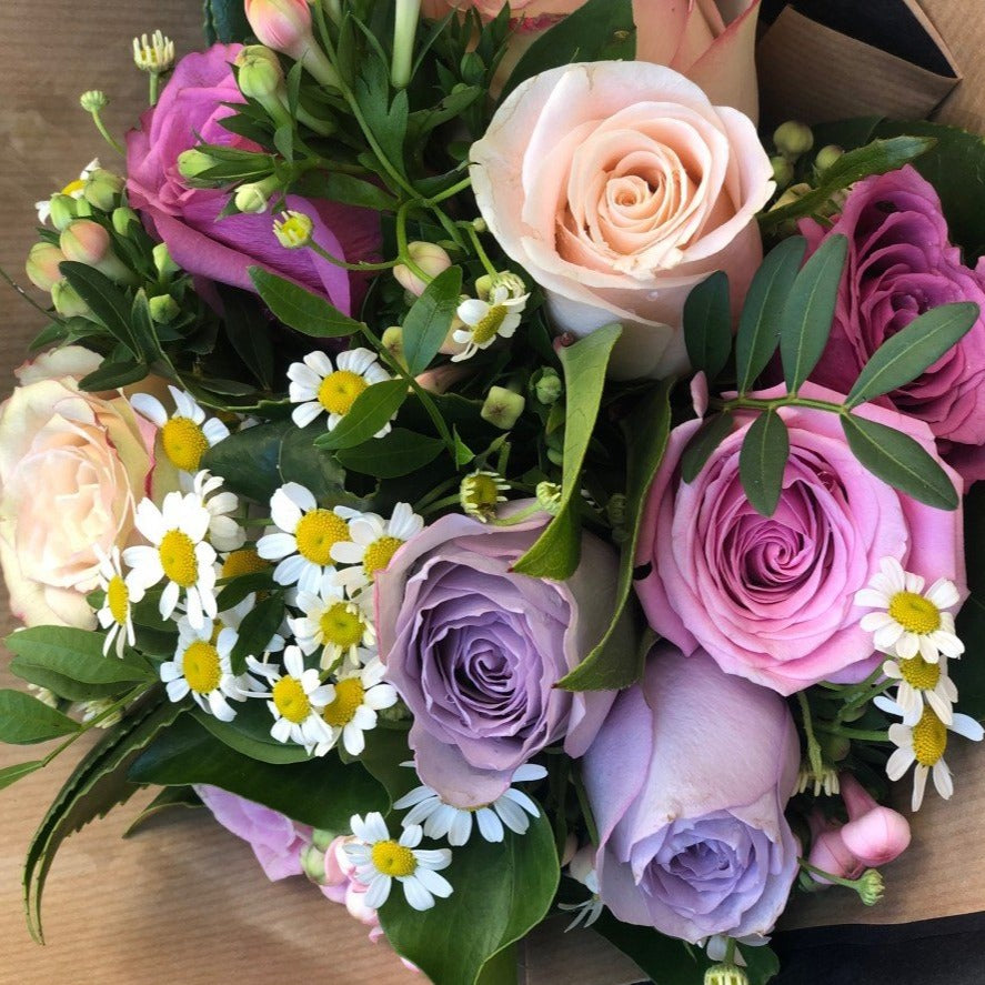 Pastel roses and foliage. 