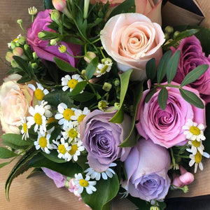 Pastel roses and foliage. 