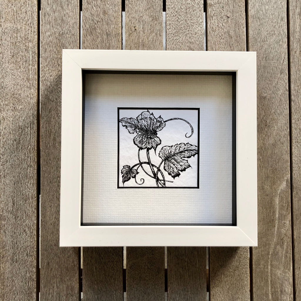 Detailed illustration of ivy leaves in a modern white frame