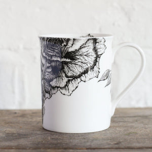 details of the rose and jasmine design on the mug