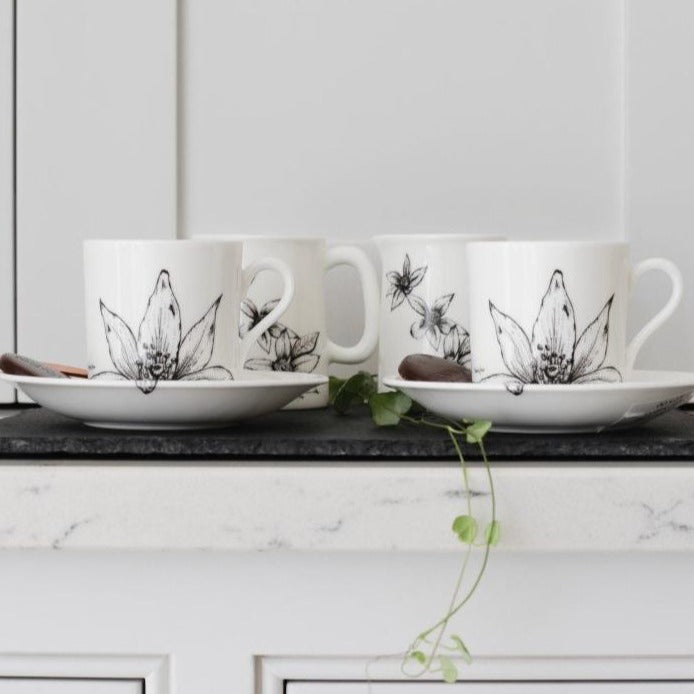 two floral decadence coffee cans with cream jug