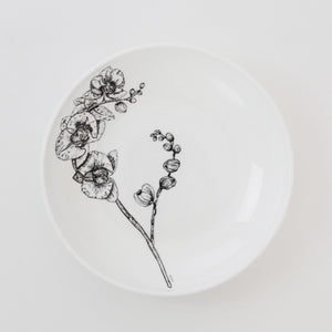 Detail of the orchid design on the pasta bowl