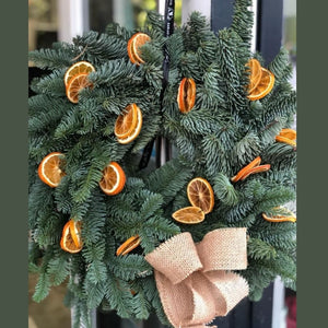 Christmas Spruce door wreath with orange slices 